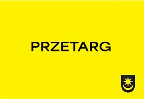 Czarne słowo "PRZETARG" na żółtym tle z czarnym herbem w prawym dolnym rogu.